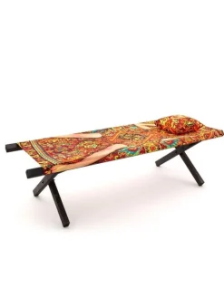 Lady on carpet ligbed - 16620