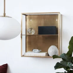 Vitrinekast messing met glazen plank en deur